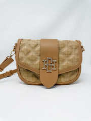 Brown woven handbag with leather accents on a white background