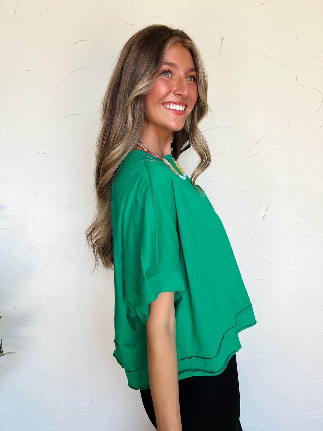 On my Level Exposed Seam Cropped Top- Kelly Green