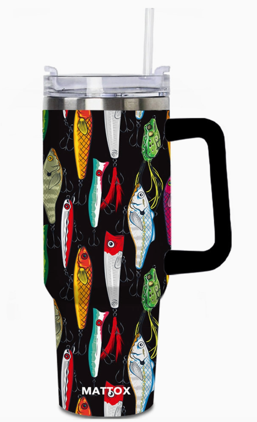 Tumbler with colorful fish pattern on a black background, featuring the brand 'Mattox'.