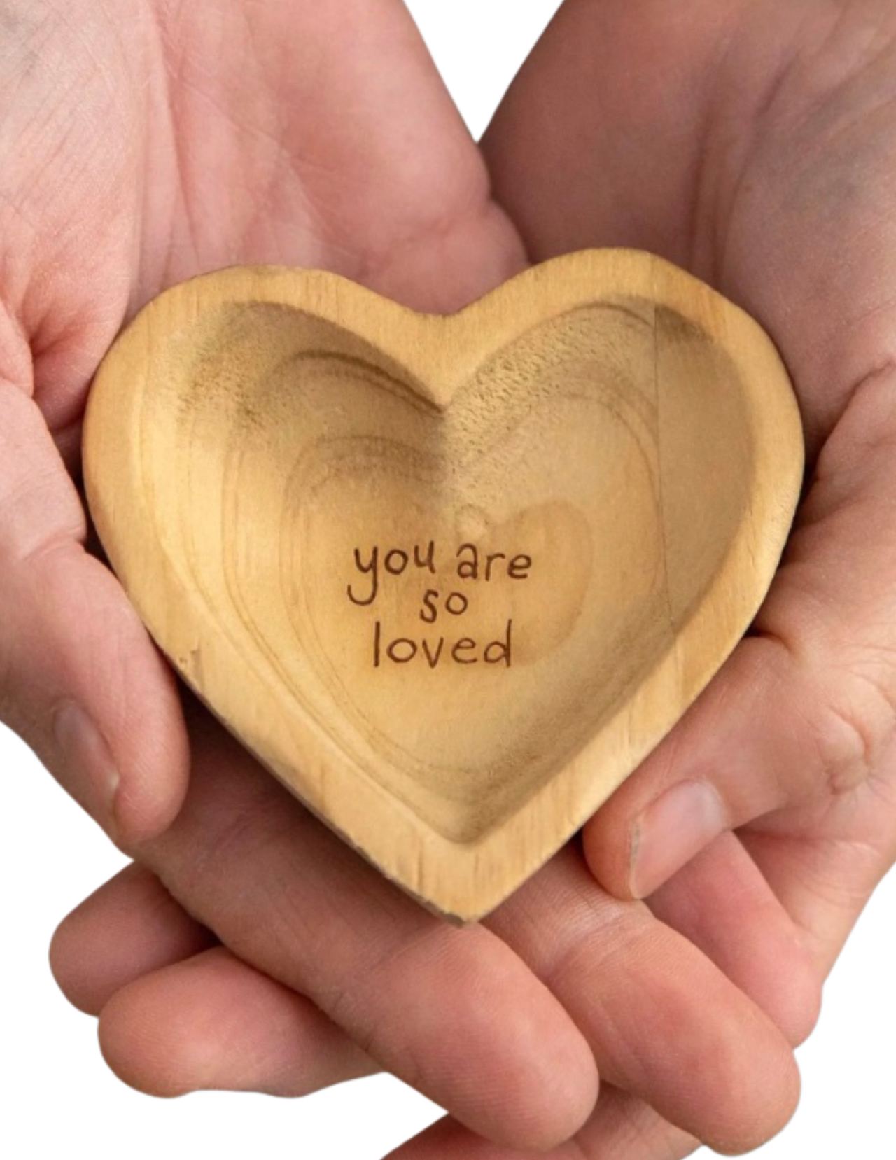 Wooden heart-shaped trinket dish held in hands with 'you are so loved' engraving.