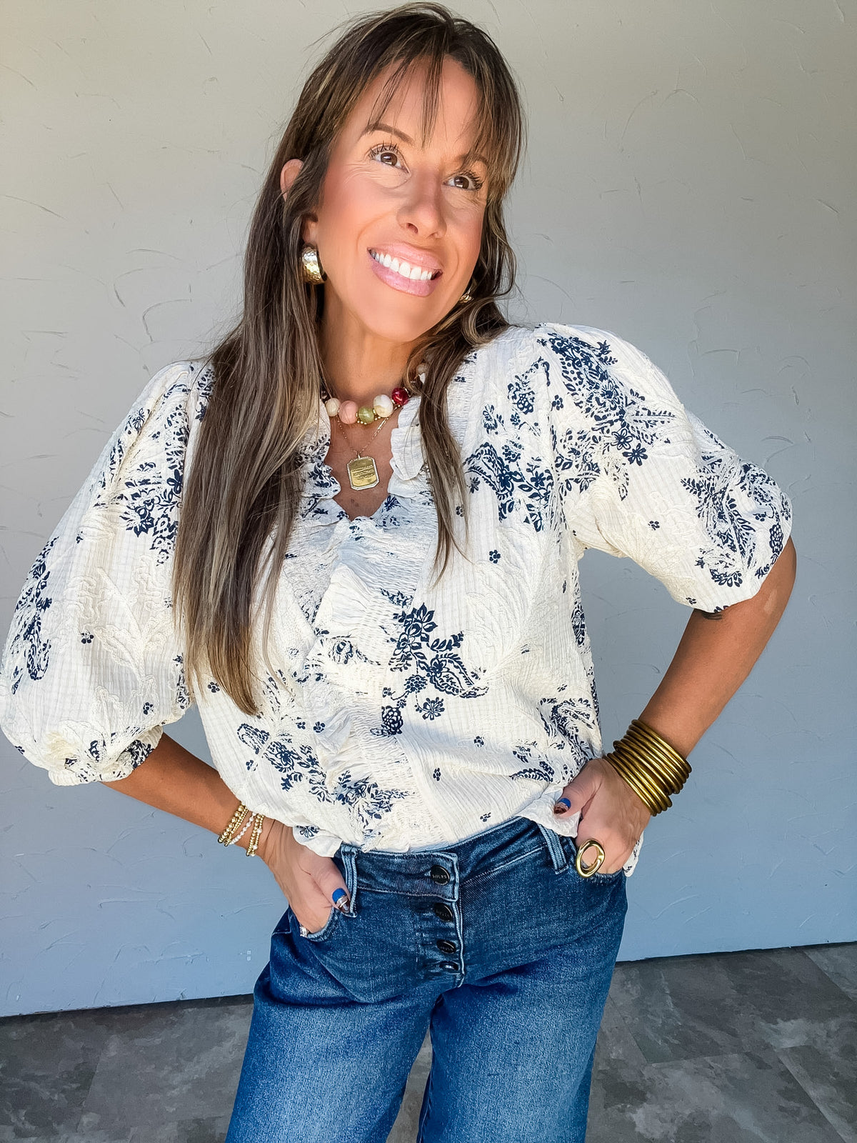 Hold It Together Floral Smocked Ruffle Top