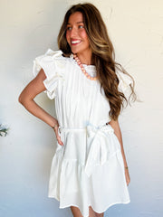 white ruffle short dress with a tie waist 