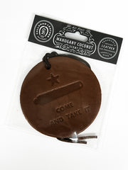 Brown leather car freshener tag with 'Come and Take It' engraving on a white background