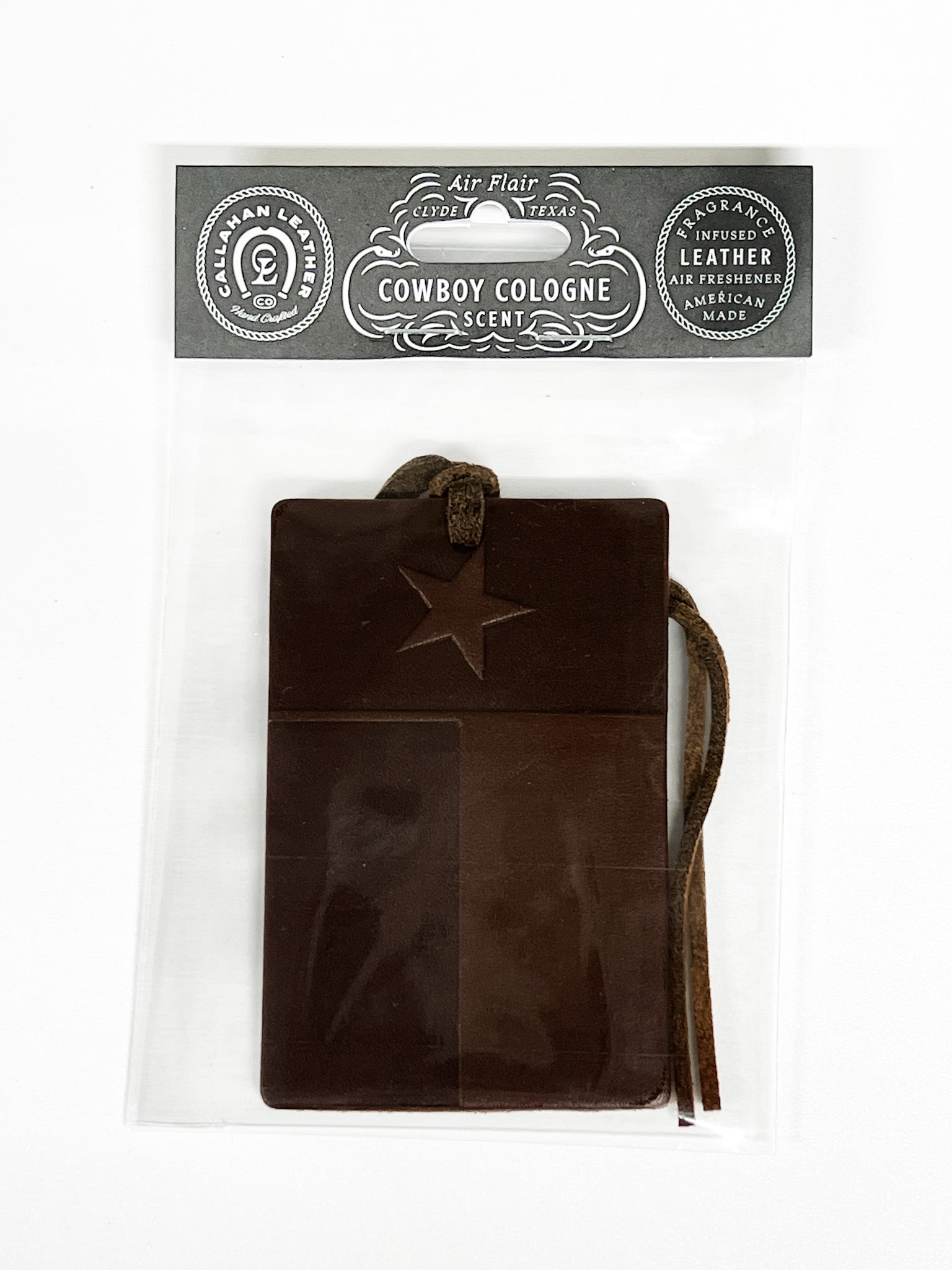 Brown leather air freshener with star design on a white background, featuring 'Cowboy Cologne' packaging.
