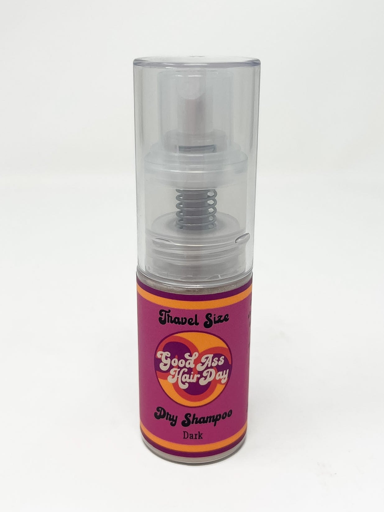 Dry shampoo canister with purple label on a white background