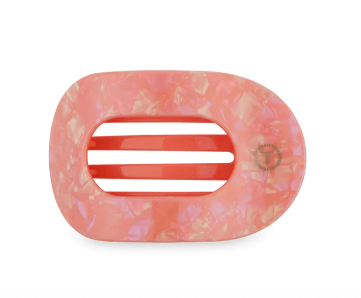 Orange marbled hair clip on a white background