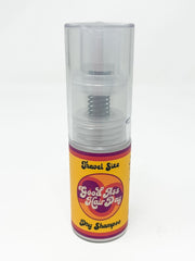 Dry shampoo canister with colorful label on a white background