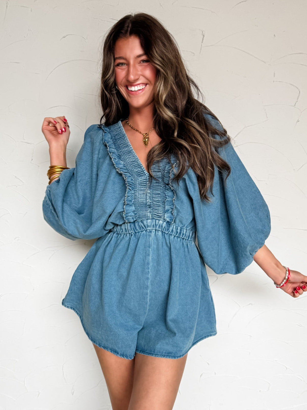 Fell For You Smocked And Ruffled Denim Romper