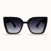 Black sunglasses with gradient lenses on a white background