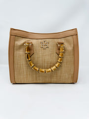 woven bag with a bamboo handle 