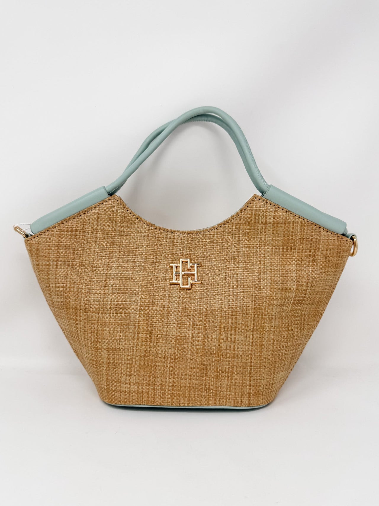 Woven handbag with mint blue detail and a logo on a white background