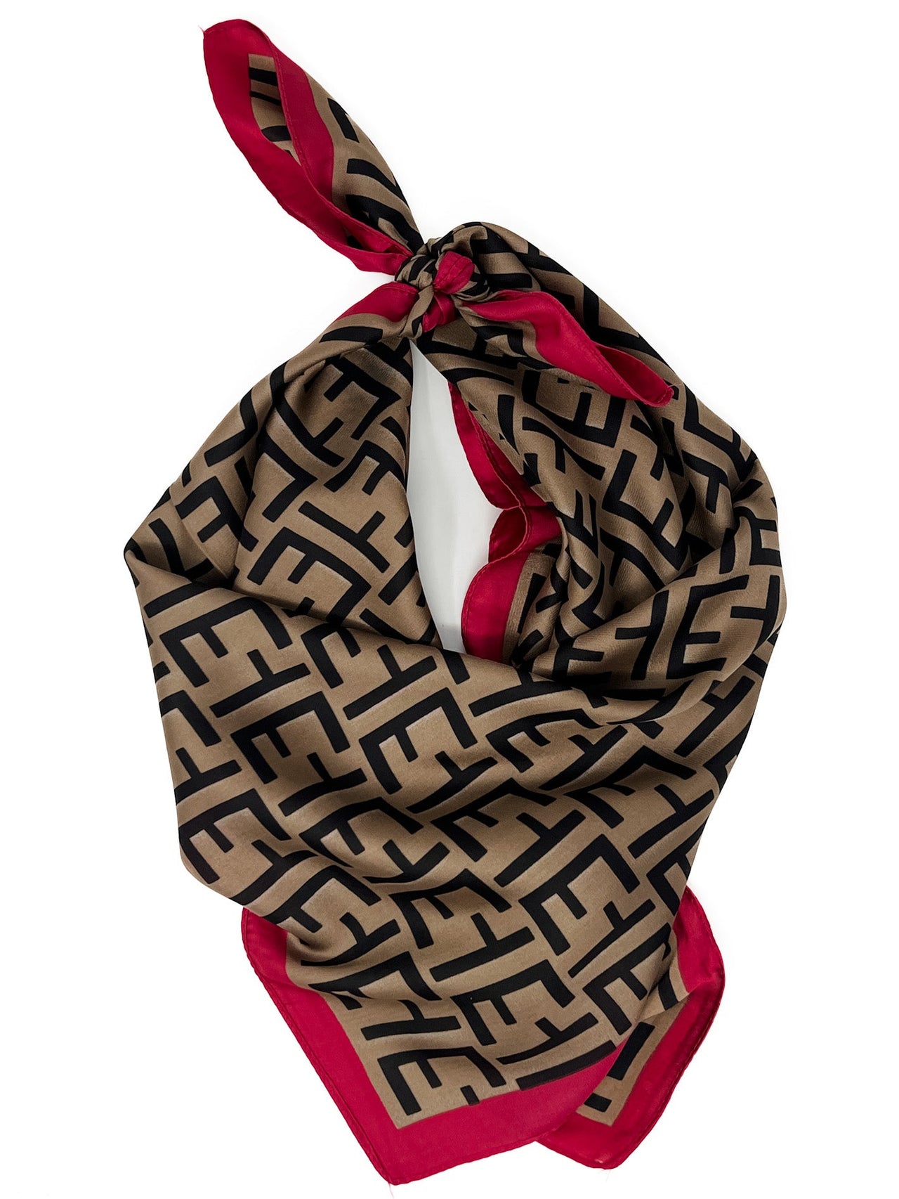 Beige scarf with black geometric pattern and red edges on a white background