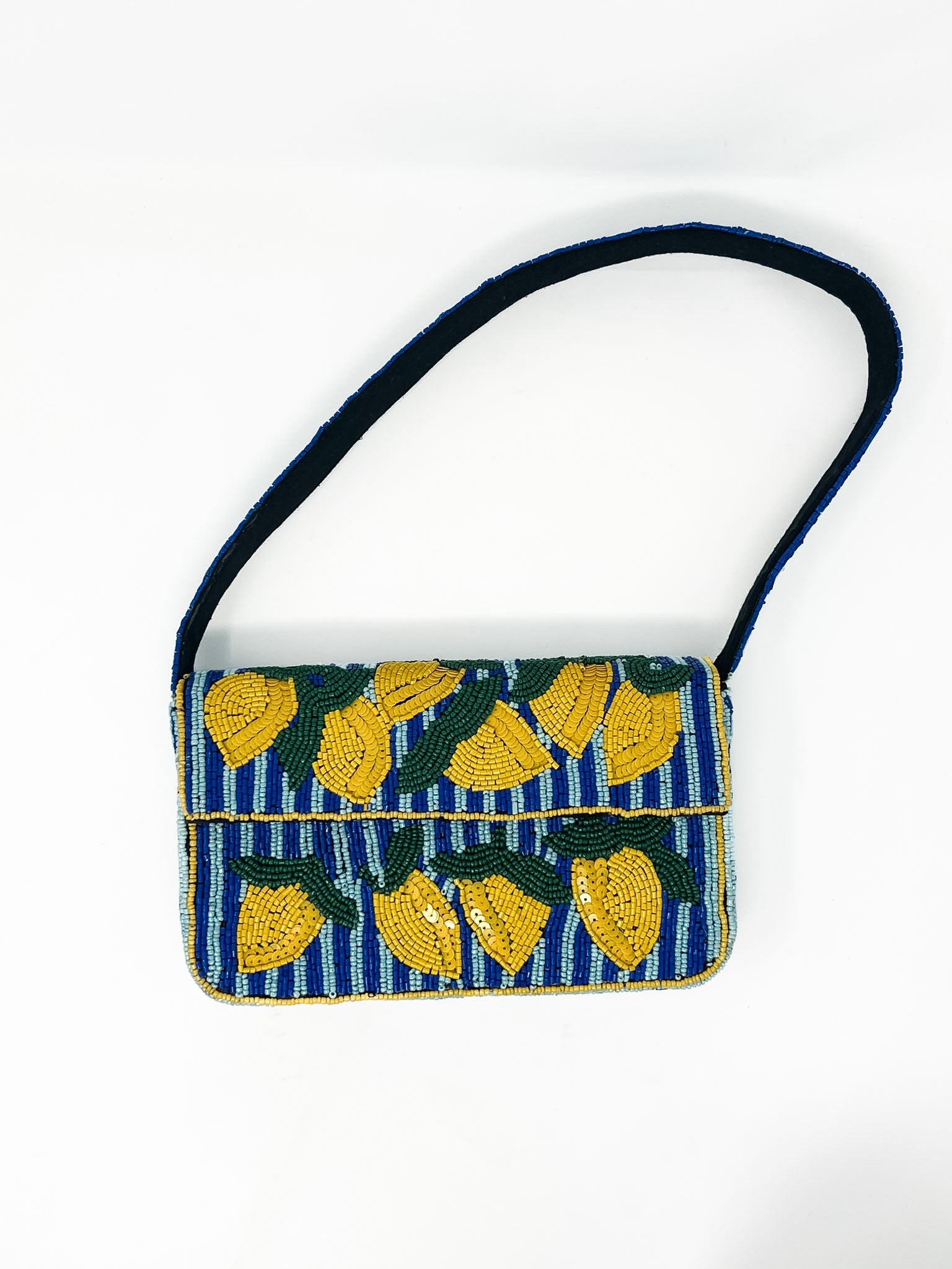 beaded handbag with lemon pattern on a white background