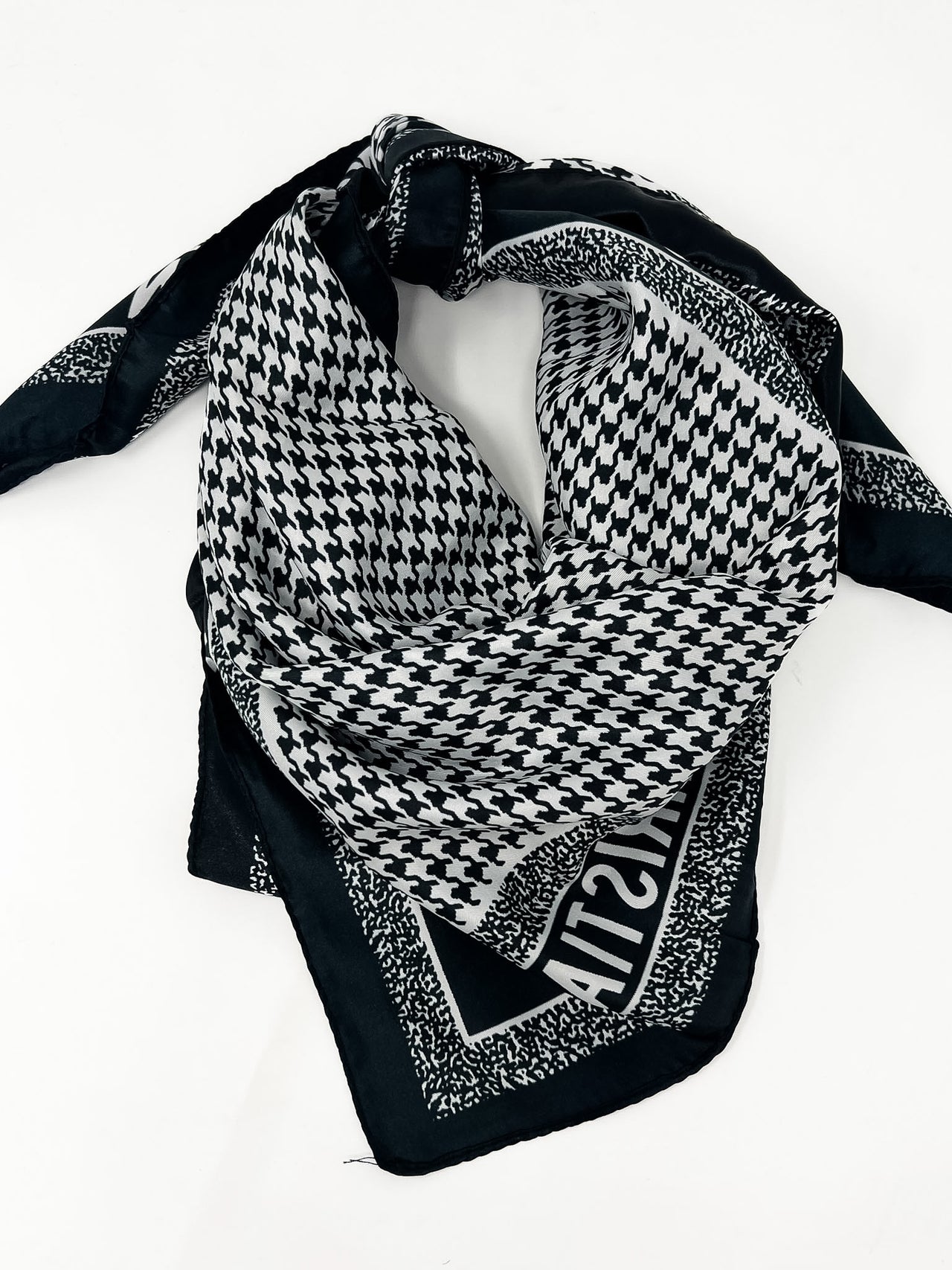 black and white houndstooth large scarf with a "Christian" border