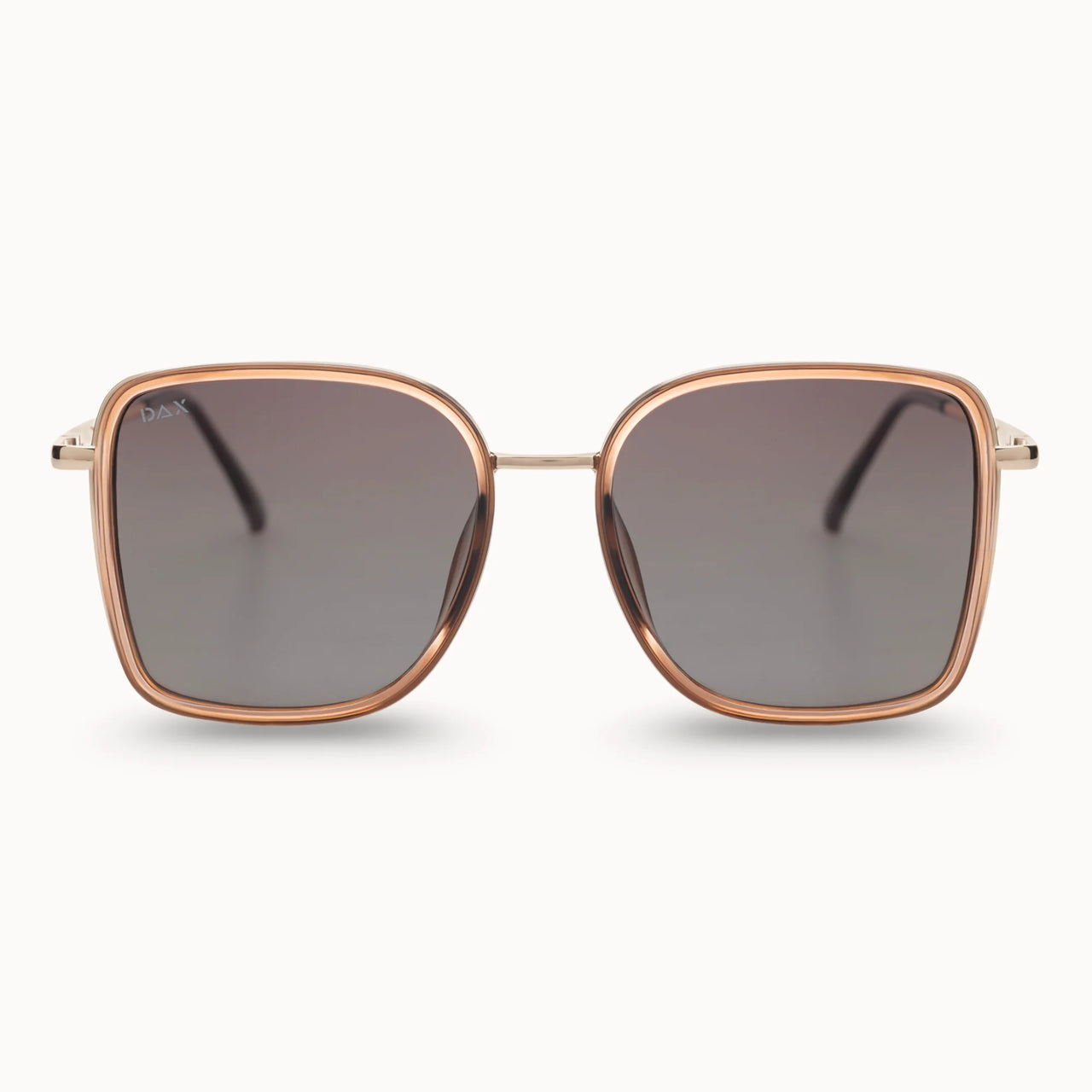 Sunglasses with rose gold frame and dark lenses on a white background