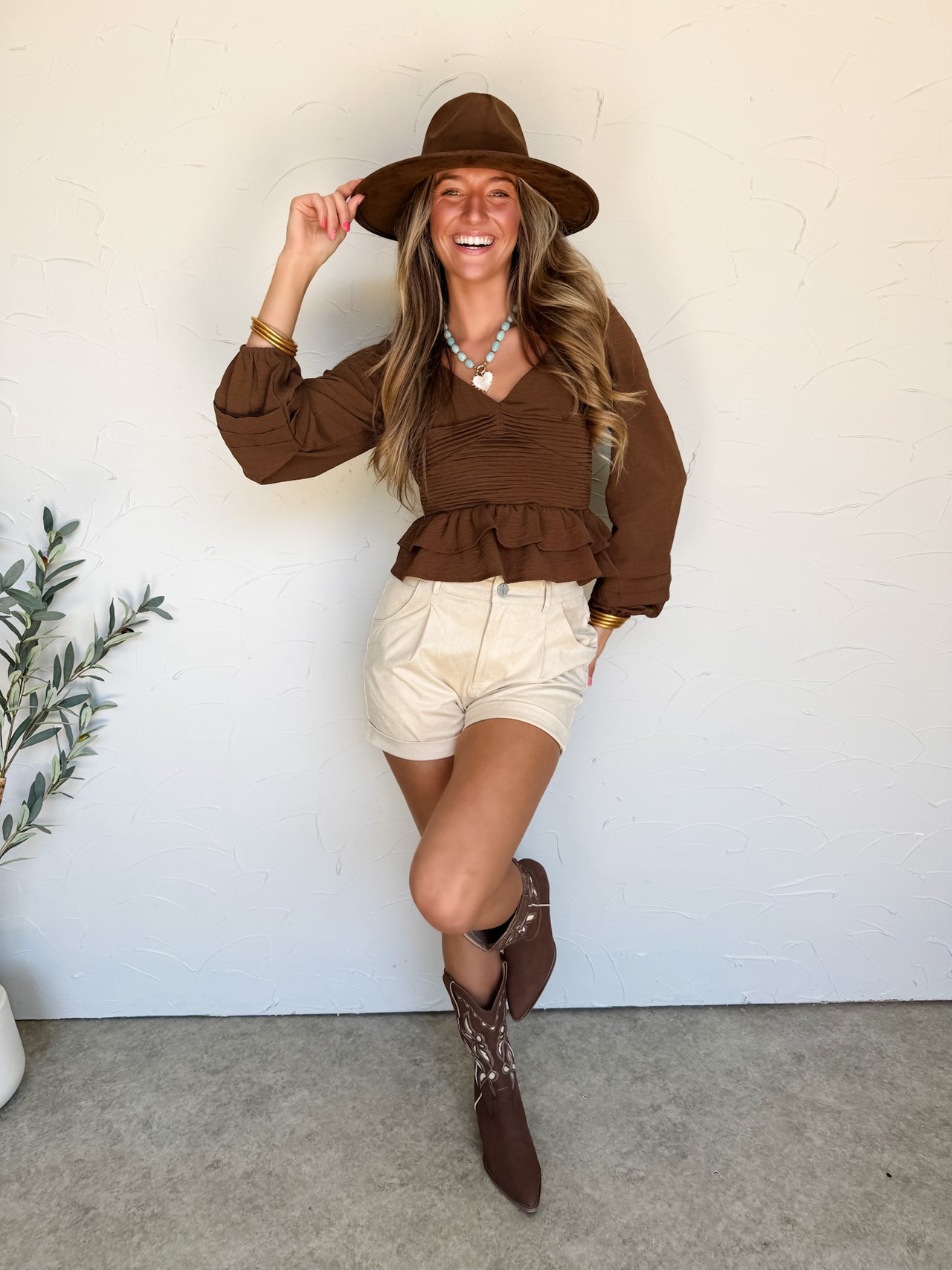 Keep You Close Brown Ruched Peplum Top