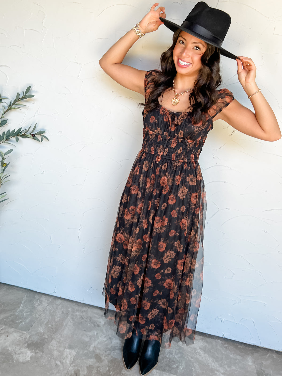 Floral Escape Organza Front Tie Midi Dress by Blu Pepper in 100% polyester, featuring rust florals on black, short puff sleeves, a front neckline tie, and a smocked waist.