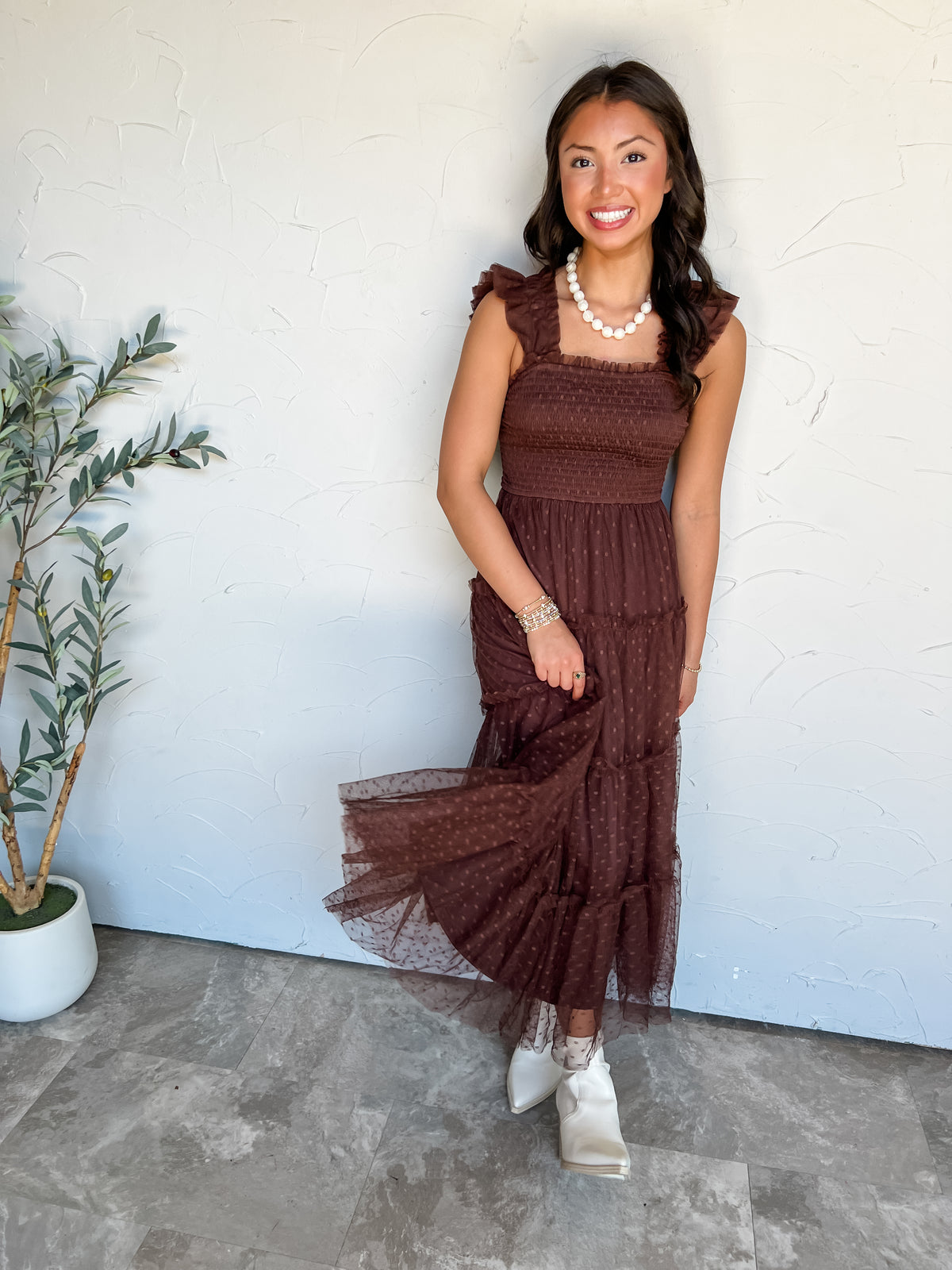 In Her Element Polka Dot Chiffon Midi Dress by Blu Pepper in 100% polyester, featuring warm brown dotted fabric, ruffled shoulder straps, a smocked bodice, and a tiered skirt.