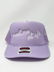 Purple cap with embroidered text on a white background