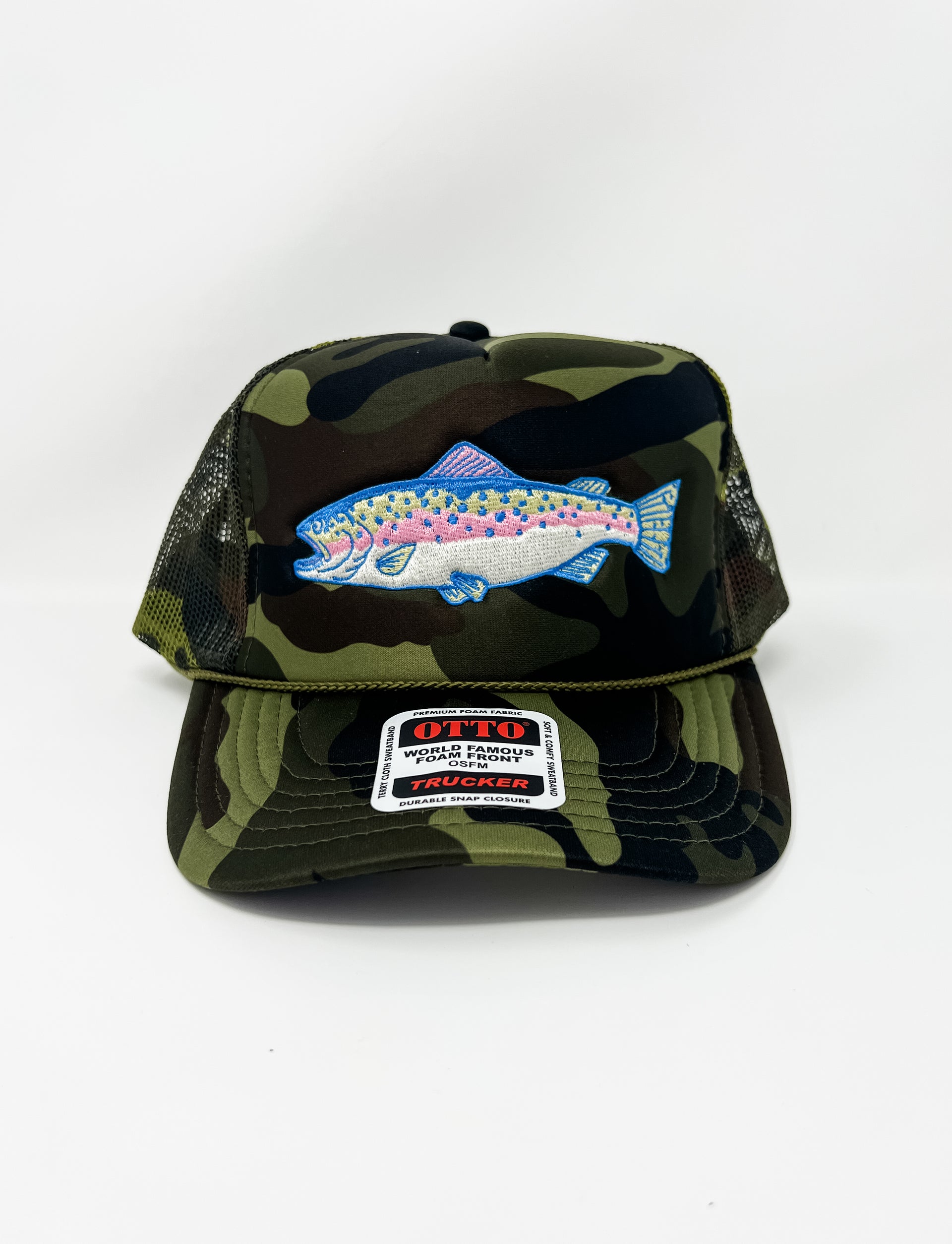 Camouflage cap with a fish design and a label on a white background