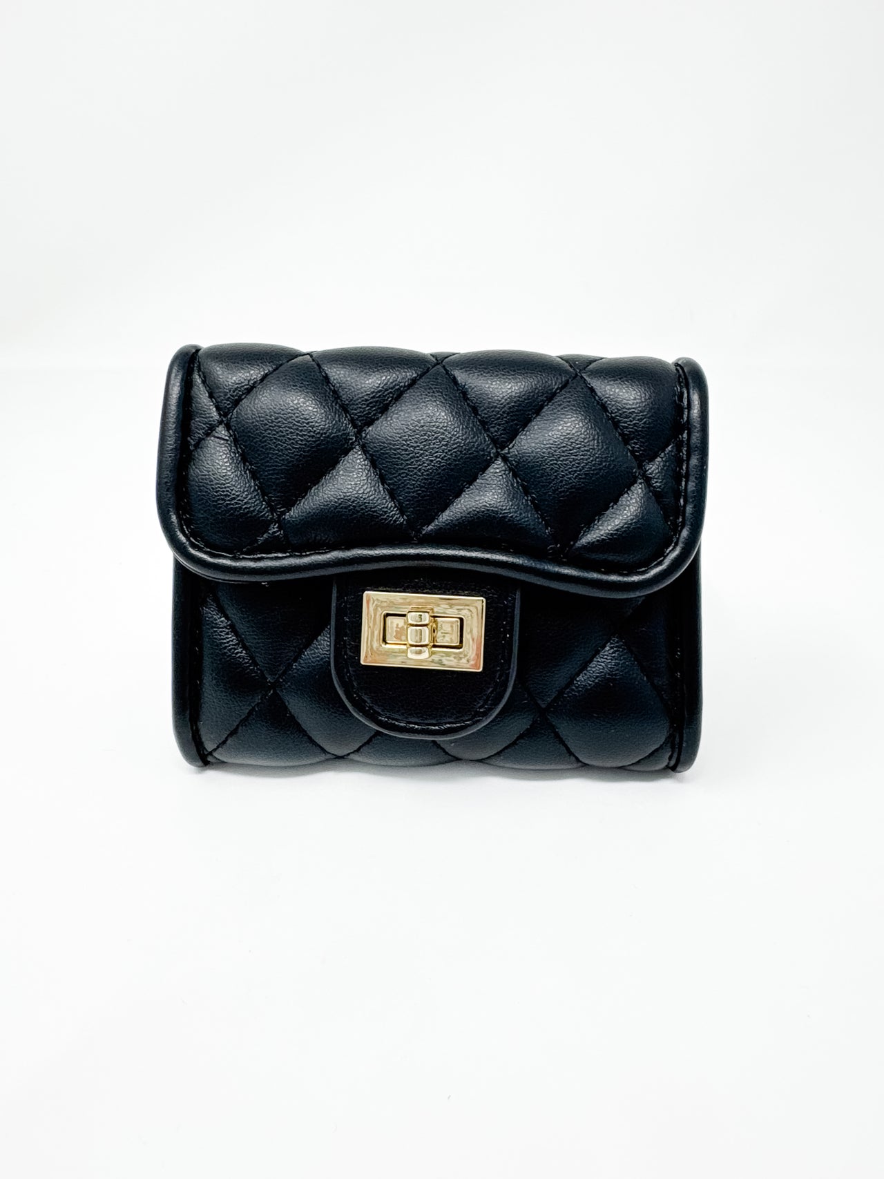 A small, compact black faux-leather wallet displayed against a solid white background. The wallet features a plush diamond-quilted pattern, a curved front flap, and a polished gold-toned metal turn-lock closure.