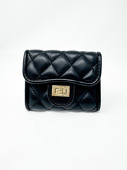 A small, compact black faux-leather wallet displayed against a solid white background. The wallet features a plush diamond-quilted pattern, a curved front flap, and a polished gold-toned metal turn-lock closure.