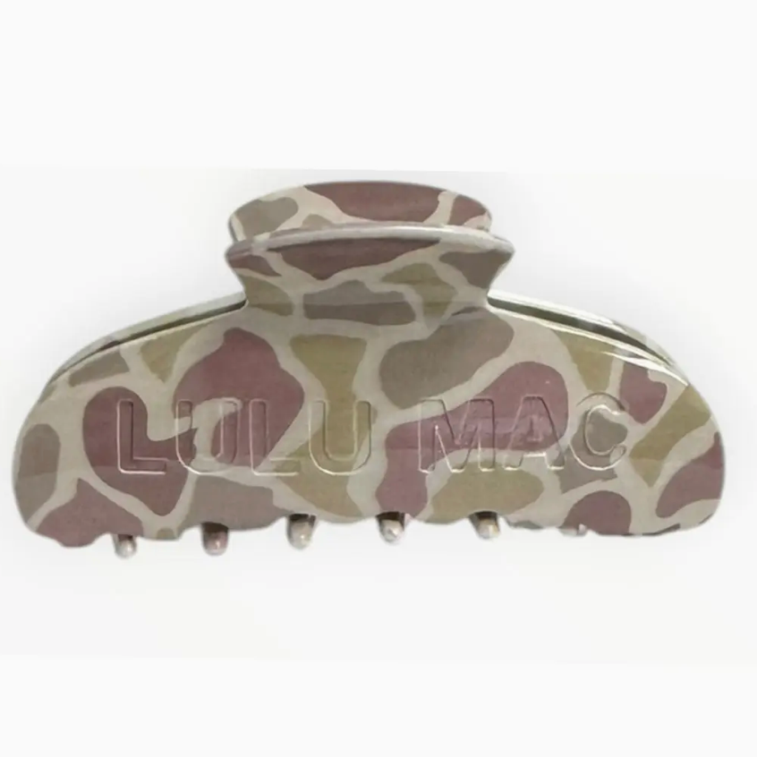 A large hair claw clip with an abstract organic pattern in muted taupe, dusty rose, and olive green, featuring a silver metal spring and a prominent 'LOULU MAC' brand engraving on the front, set against a plain white background.