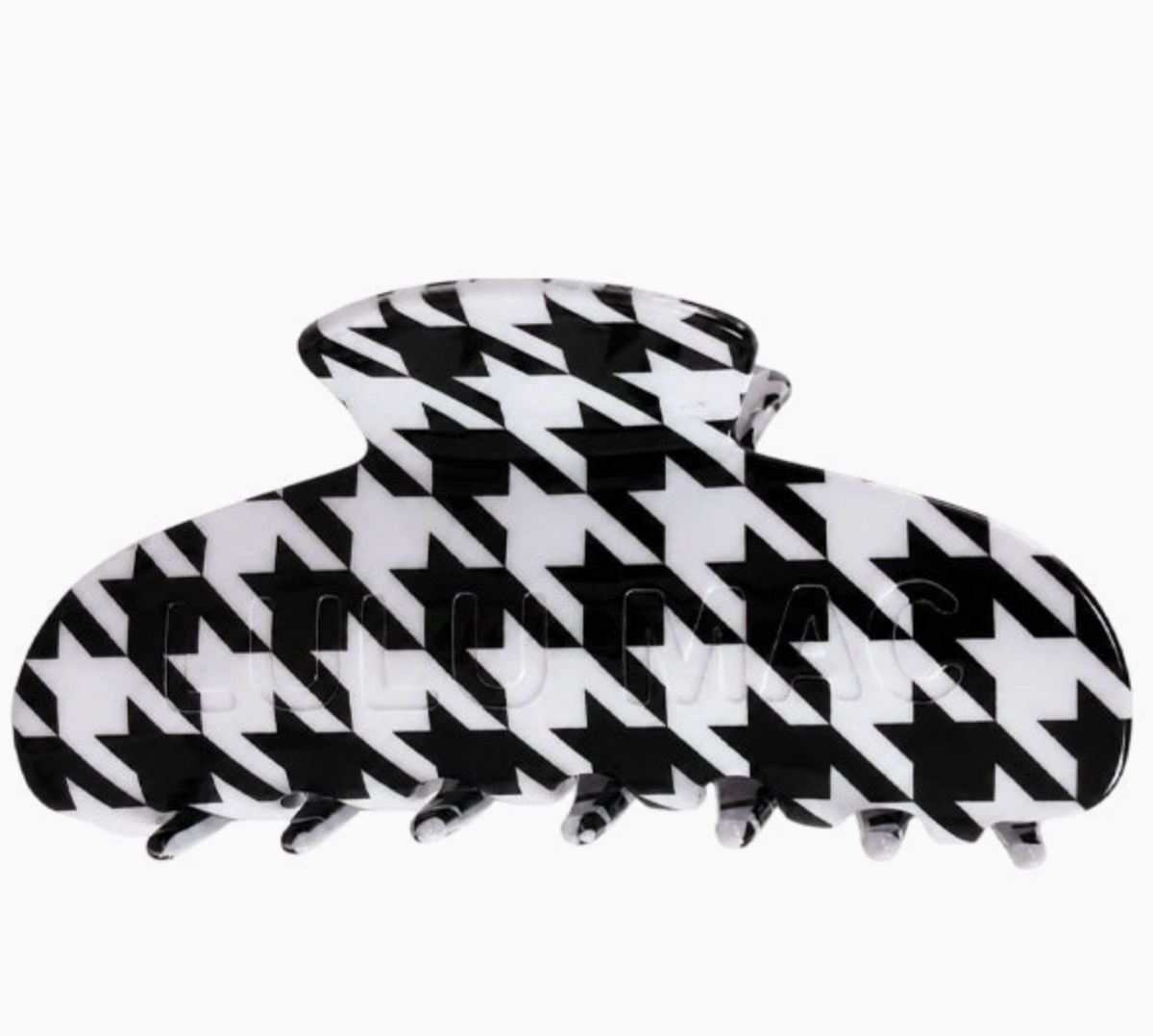 A large claw hair clip with a bold black and white houndstooth pattern, shown against a plain white background.