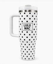 A white travel mug with black polka dots and a custom 'LULU MAC' nameplate, shown on a clean white background.