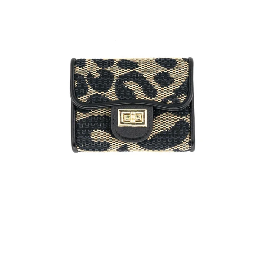 A small bi-fold wallet featuring a black and beige woven leopard print pattern, black leather trim, and a gold-tone metal logo clasp on a plain white background.