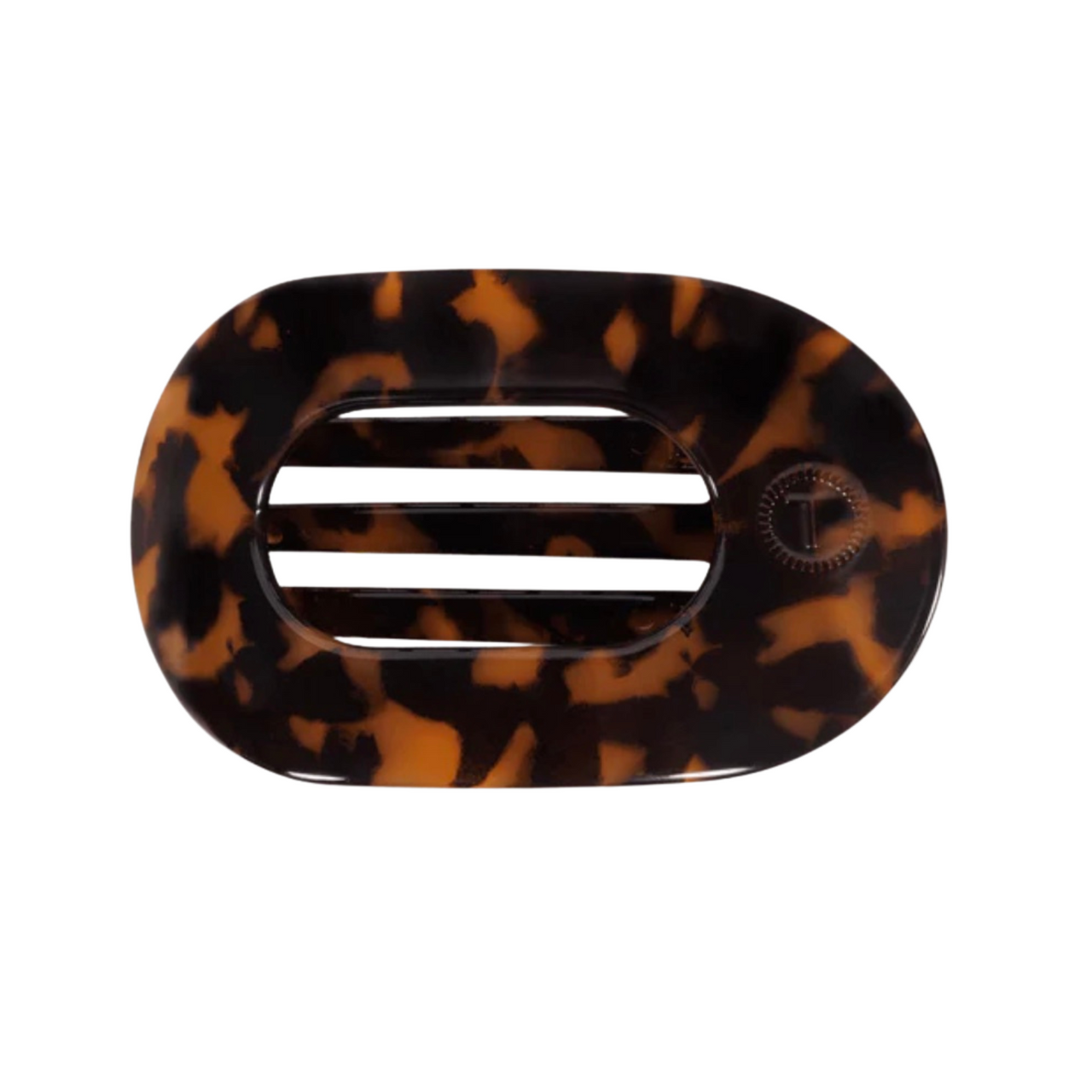 Tortoiseshell patterned hair clip on a white background