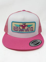 Pink and white trucker hat with 'Red Dirt Hat Co.' logo on a white background