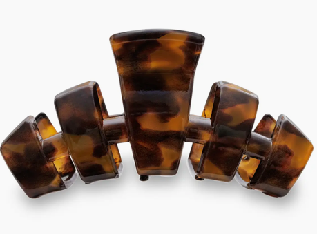 Tortoiseshell hair clip on a white background