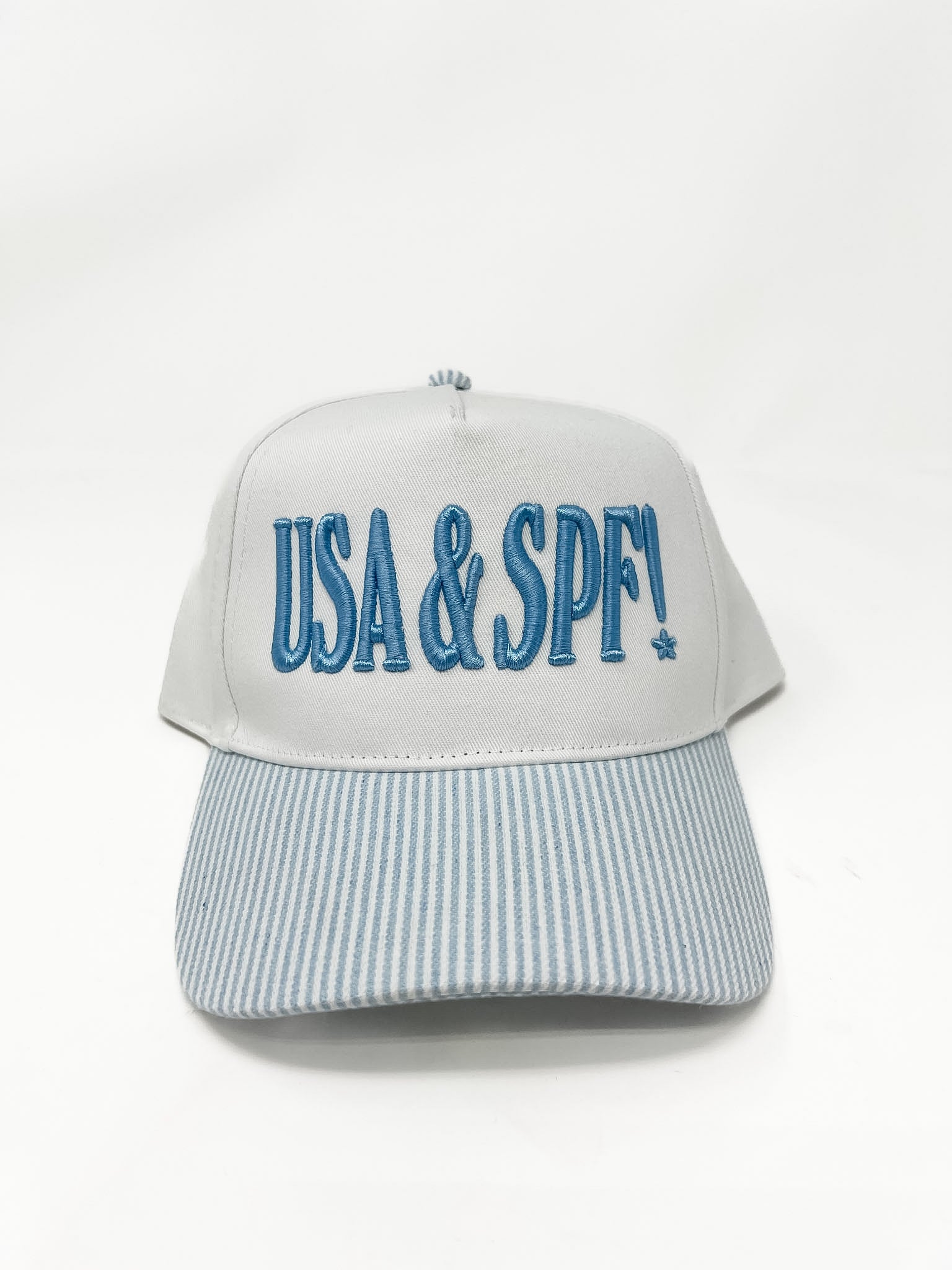 Cap with 'USA & SPF!' text on a white background