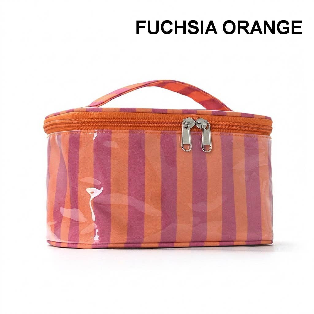 A striped cosmetic bag in fuchsia orange and pink with a clear front panel and top handle, shown on a white background with the text 'FUCHSIA ORANGE' above it.