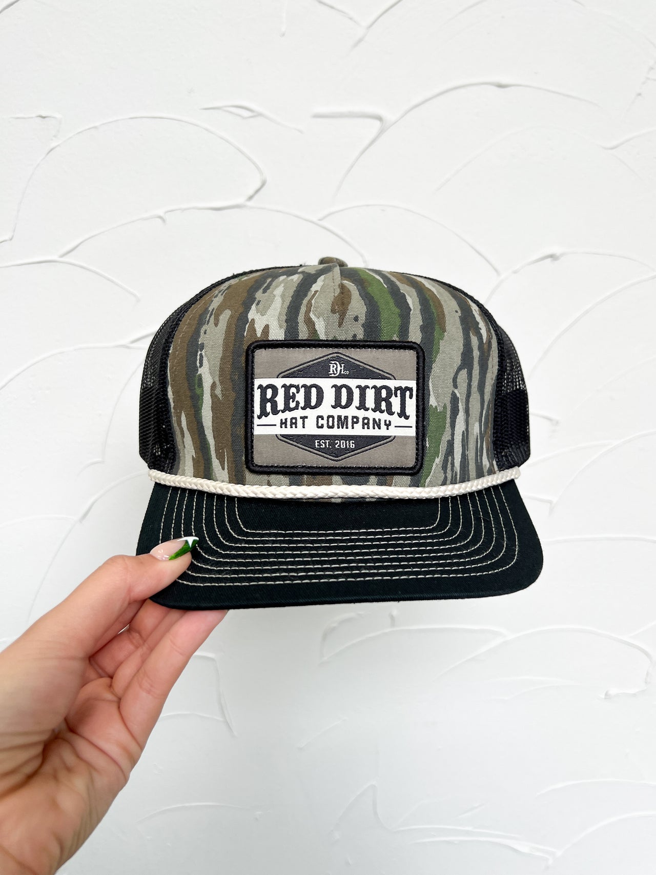 The Trapper Hat- Wooded Camo/Black