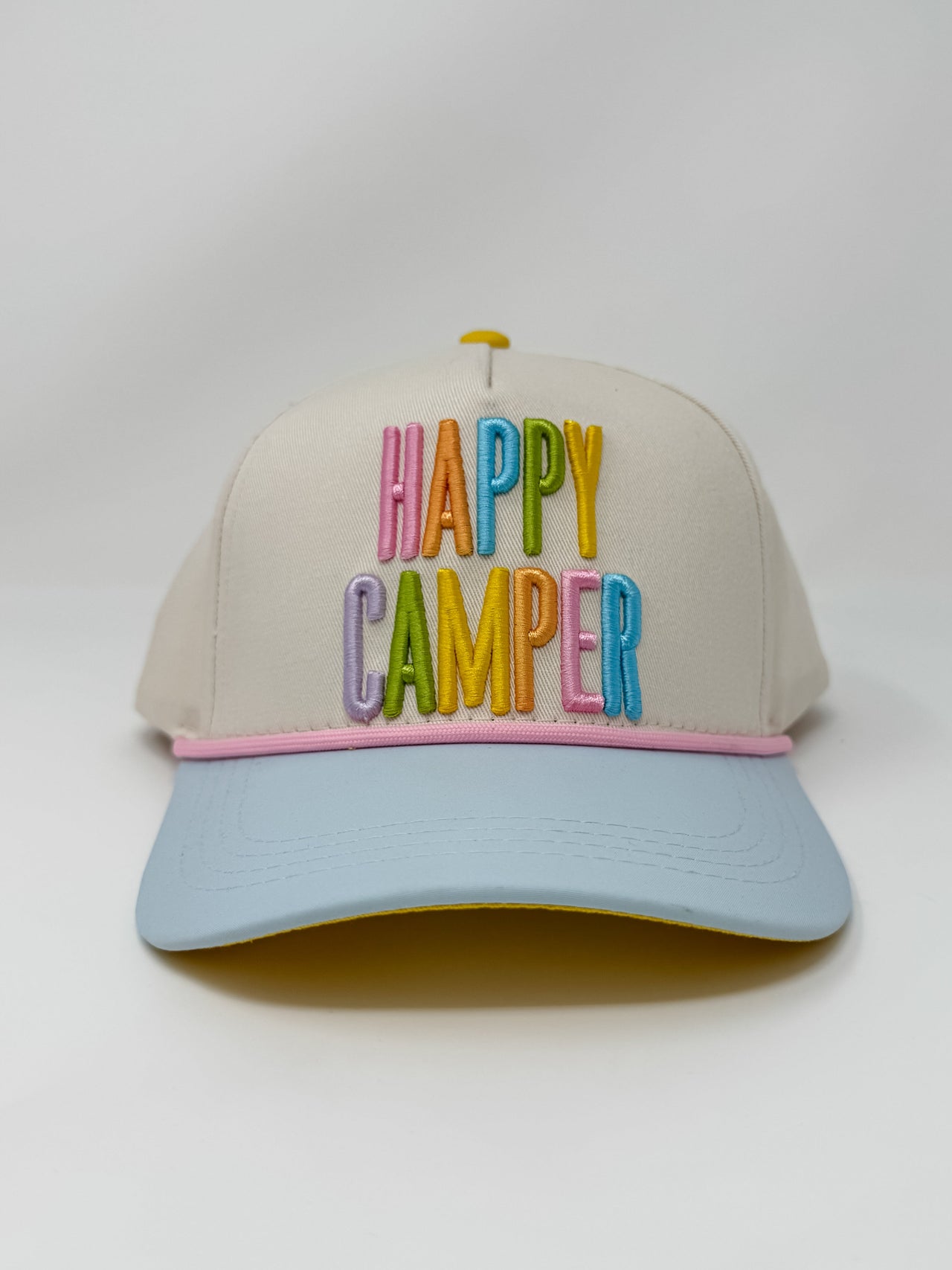 Cap with 'Happy Camper' text on a white background