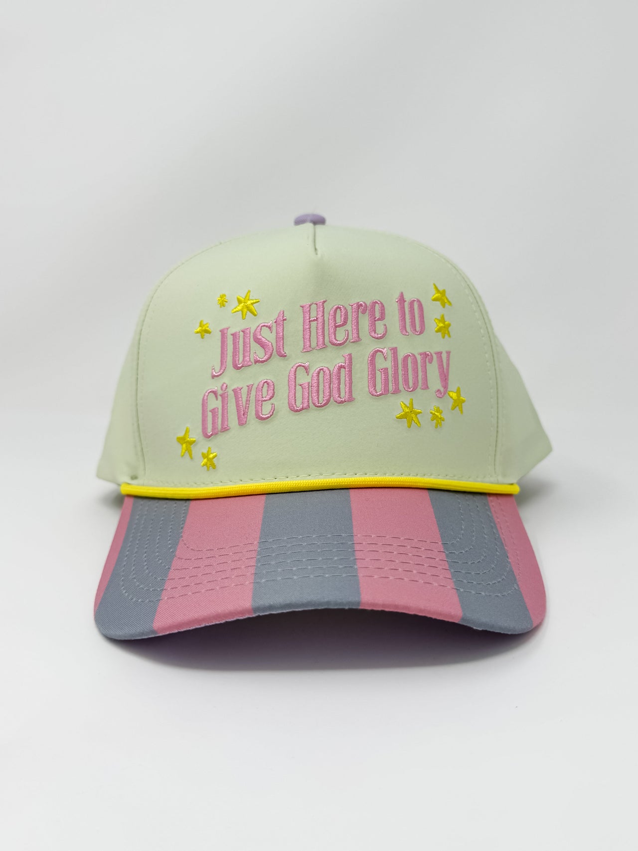Cap with 'Just Here to Give God Glory' text on a light green background