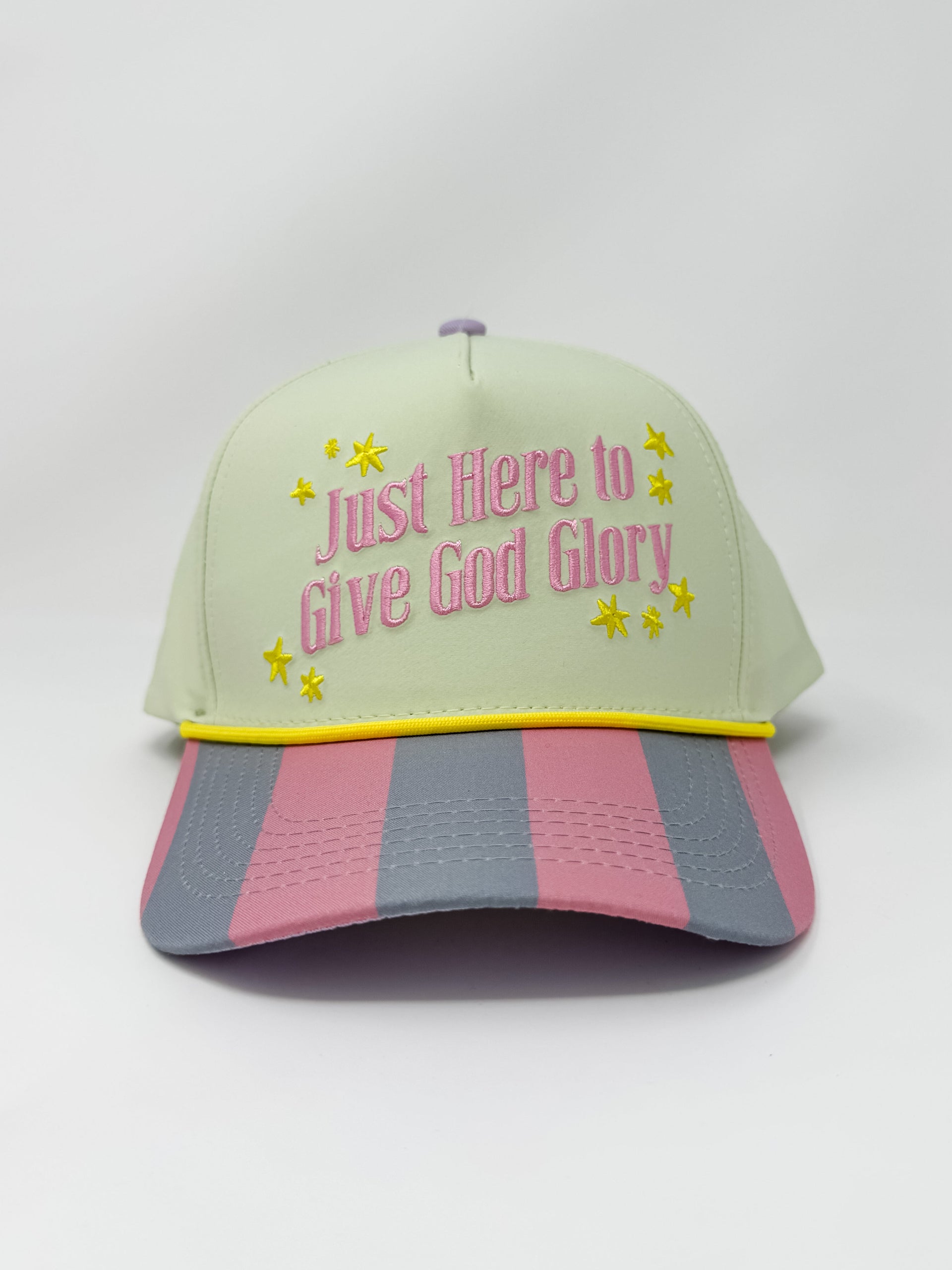 Cap with 'Just Here to Give God Glory' text on a light green background